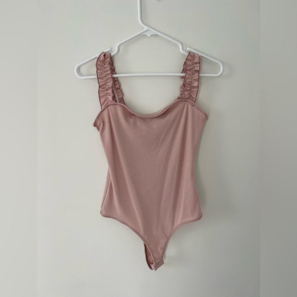 Pink body suit!